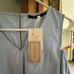 Brand new blouse. From local boutique. Size medium. Bell sleeves